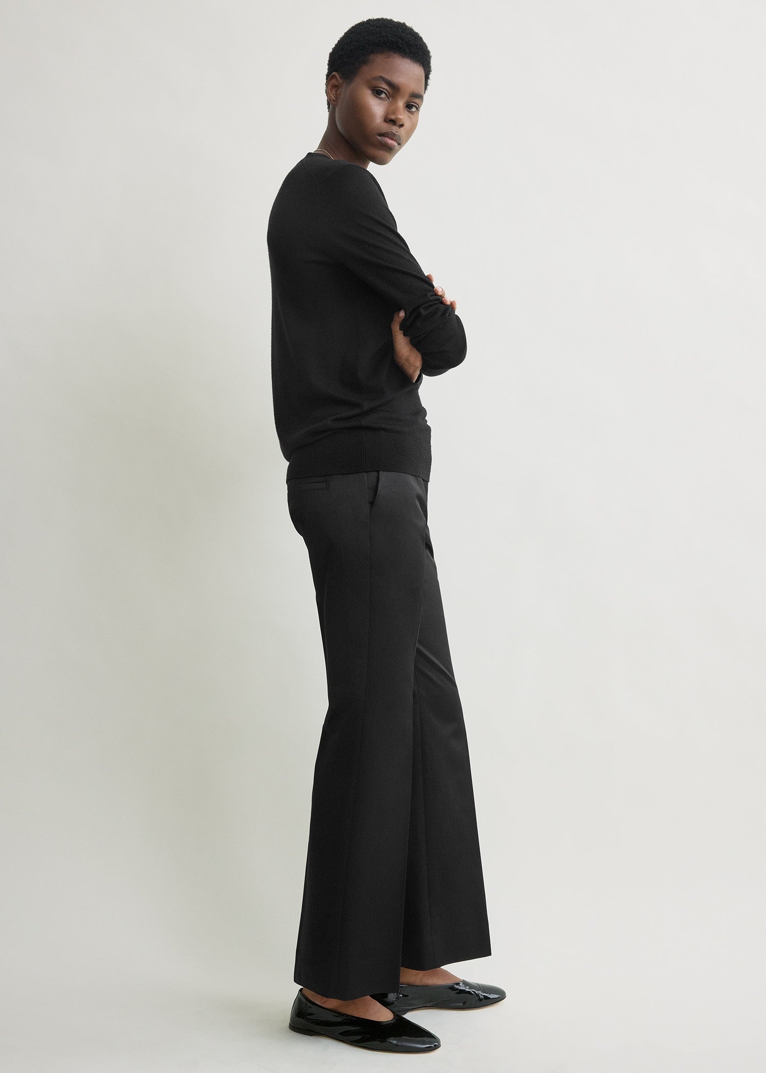 Kick flare raw-edge trousers black