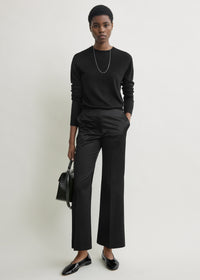 Kick flare raw-edge trousers black