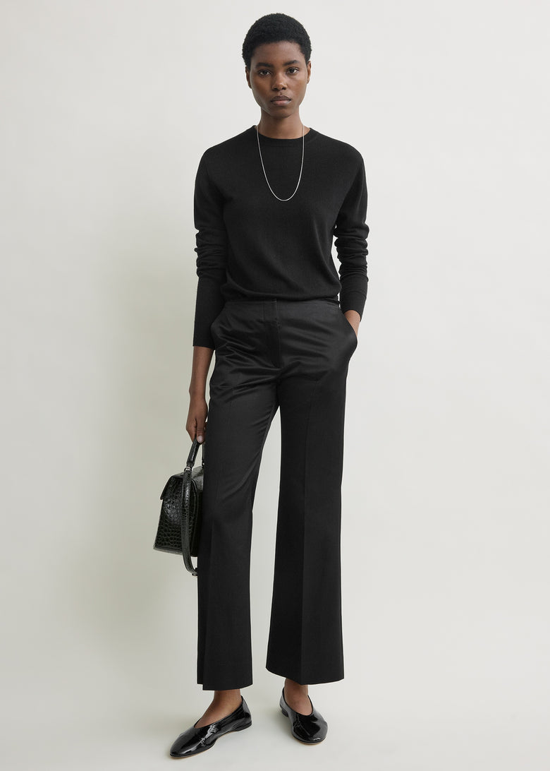 Kick flare raw-edge trousers black