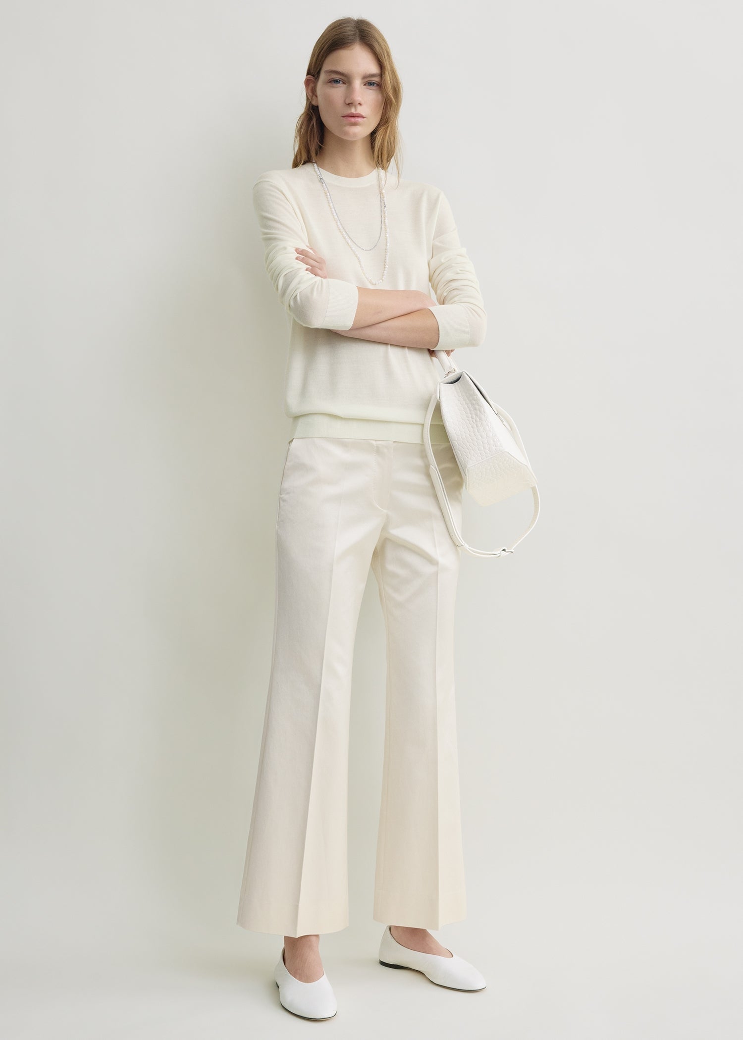 Kick flare raw-edge trousers stone