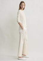 Kick flare raw-edge trousers stone