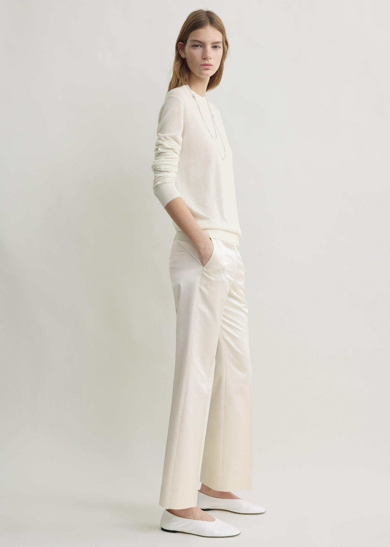 Kick flare raw-edge trousers stone