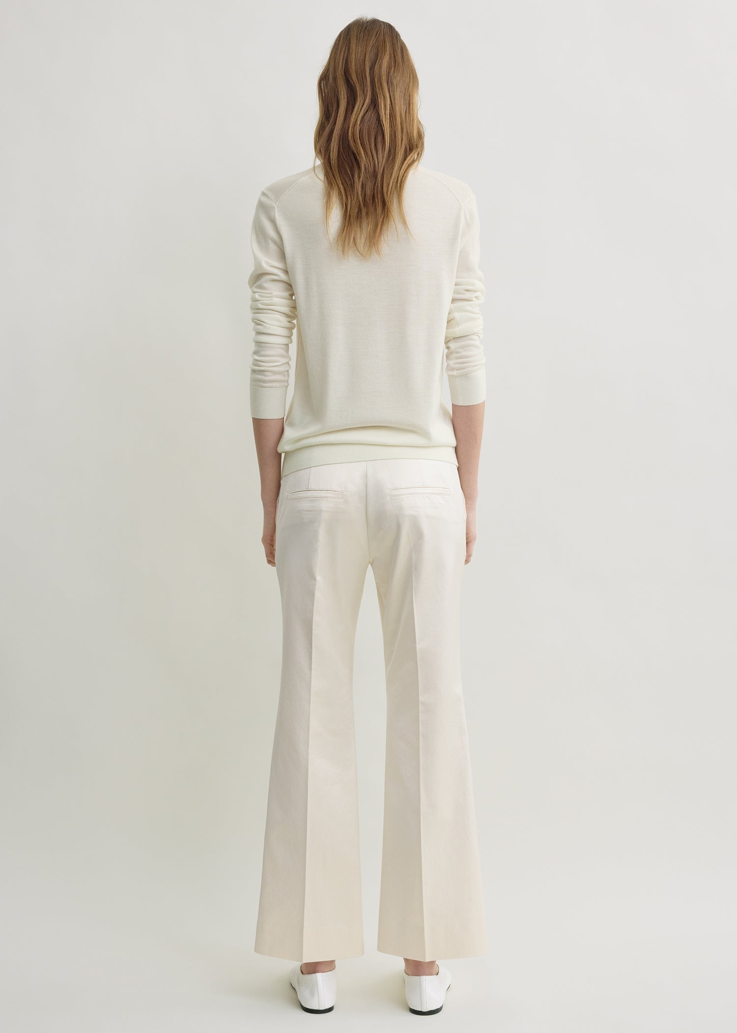 Kick flare raw-edge trousers stone