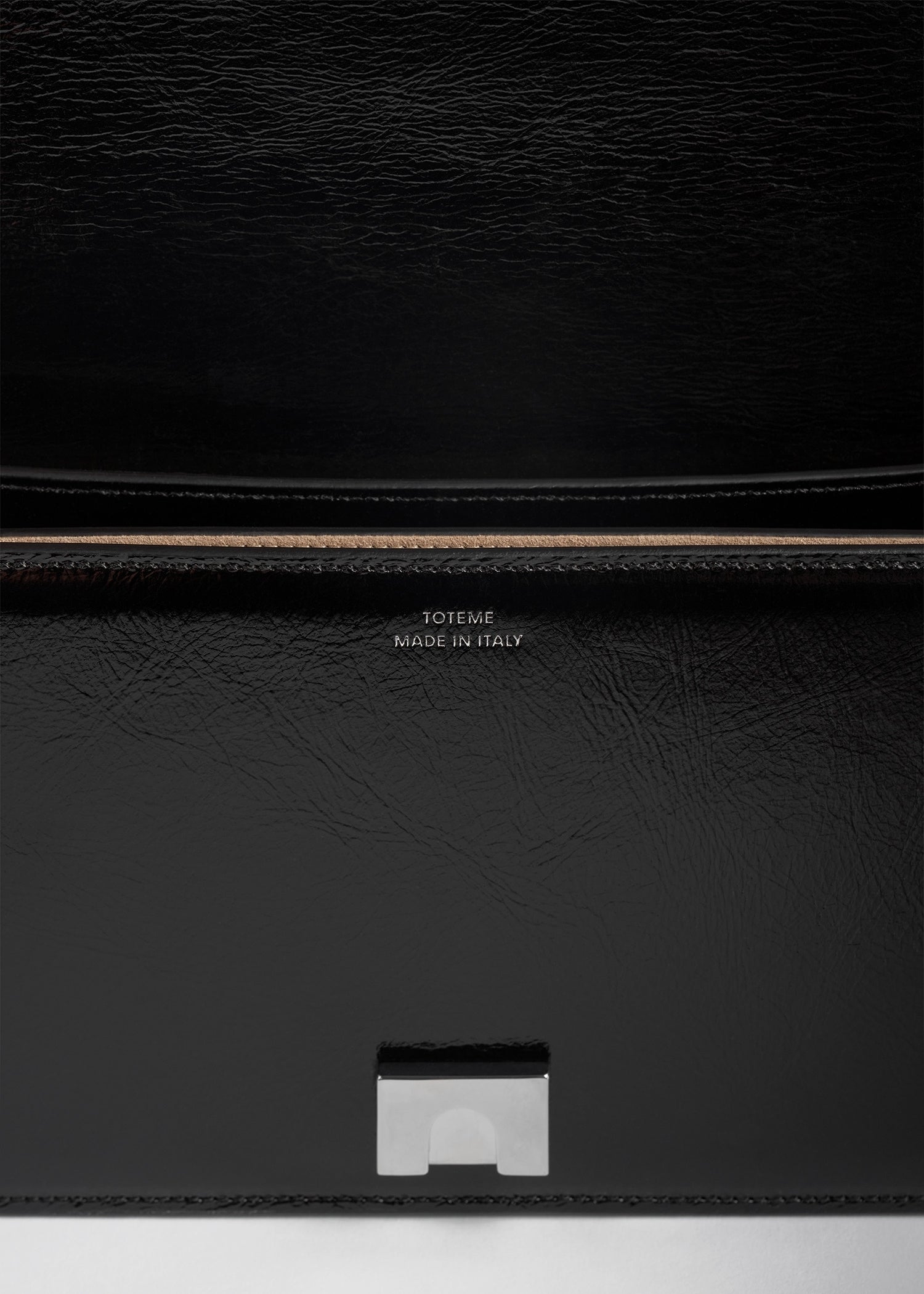 Mini T-flap naplack bag black