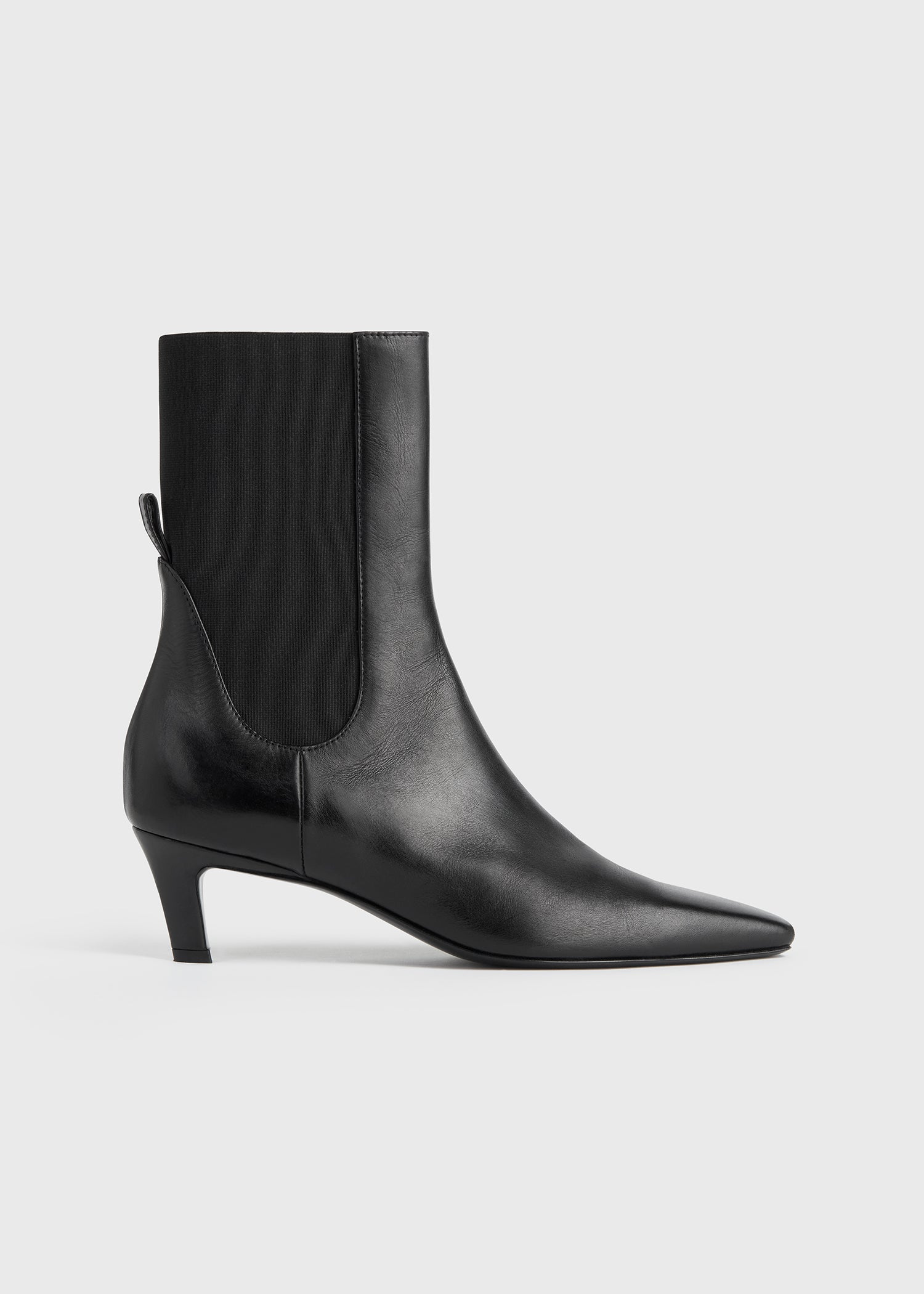 Leather mid-heel boots black from Toteme - $880