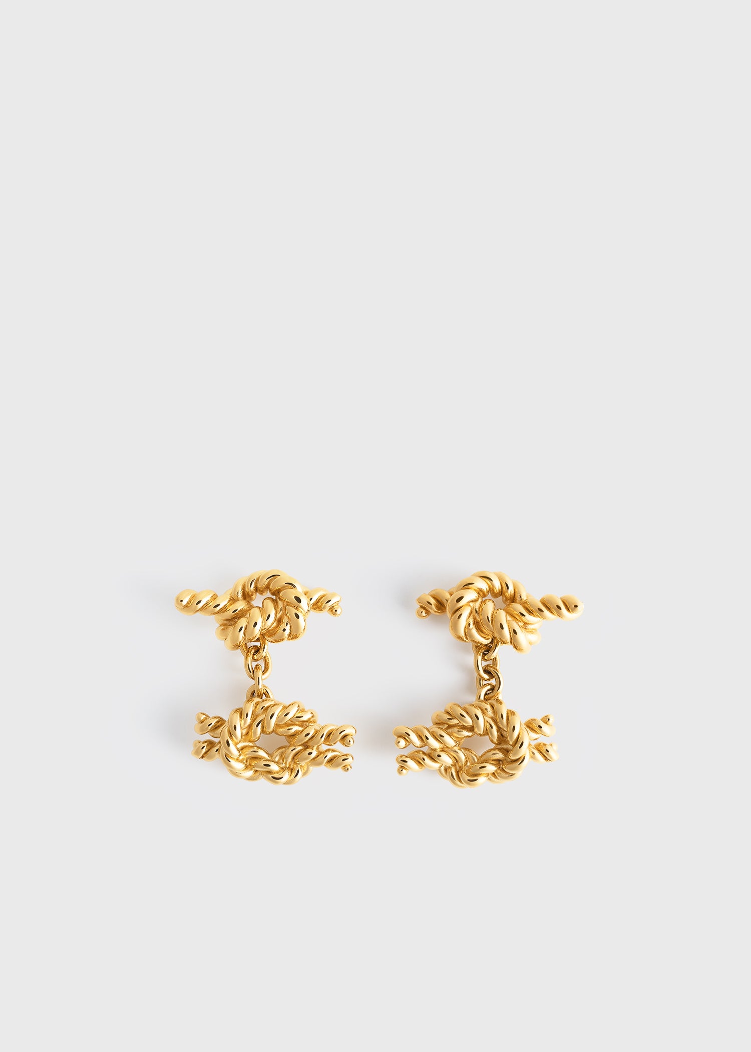 Rope knot cufflinks gold from Toteme - $390