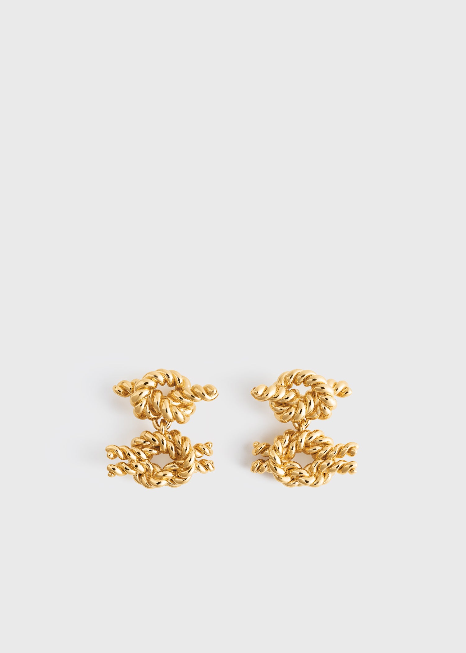 Rope knot earrings gold from Toteme - $212