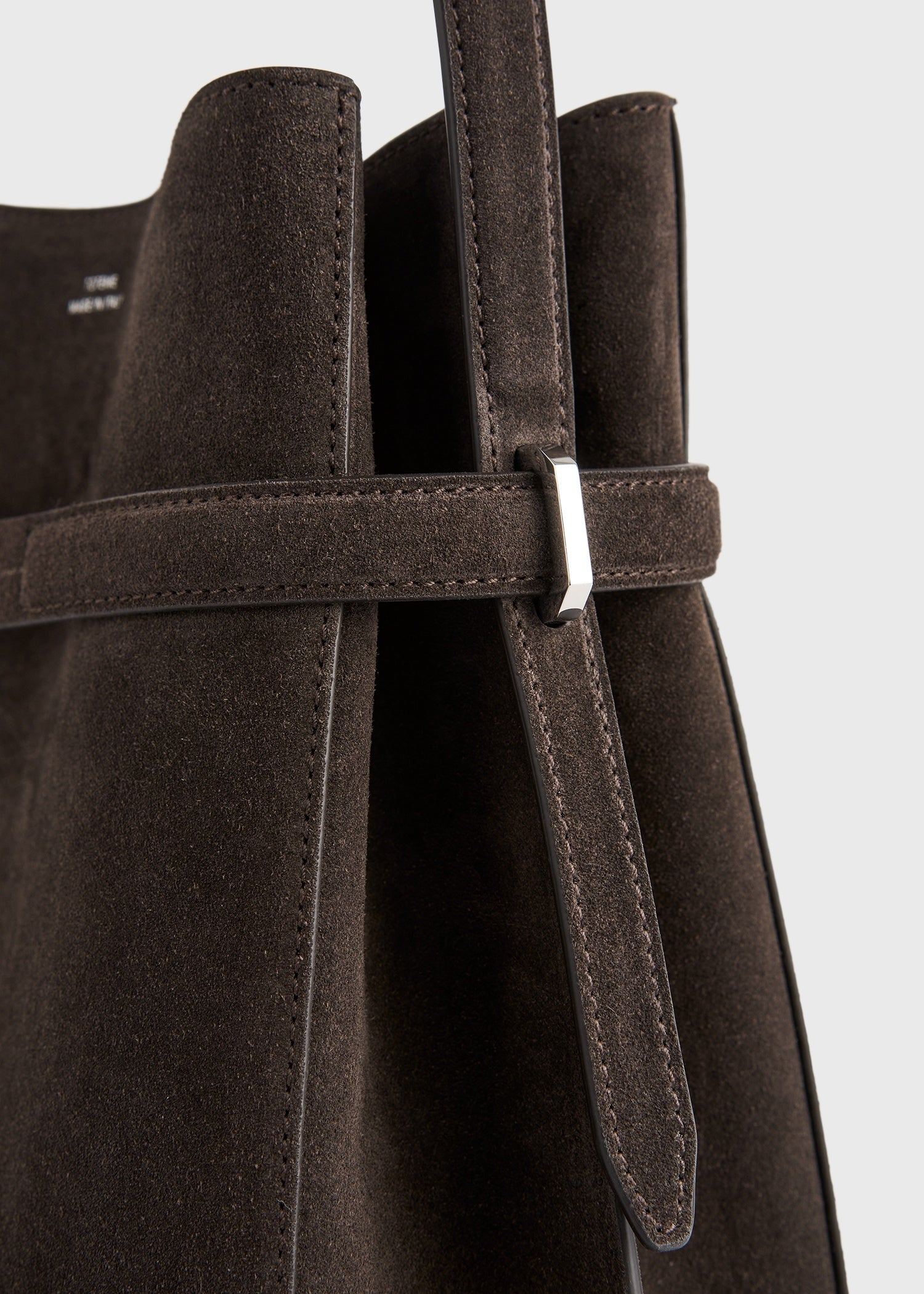 Belted suede bucket bag brown