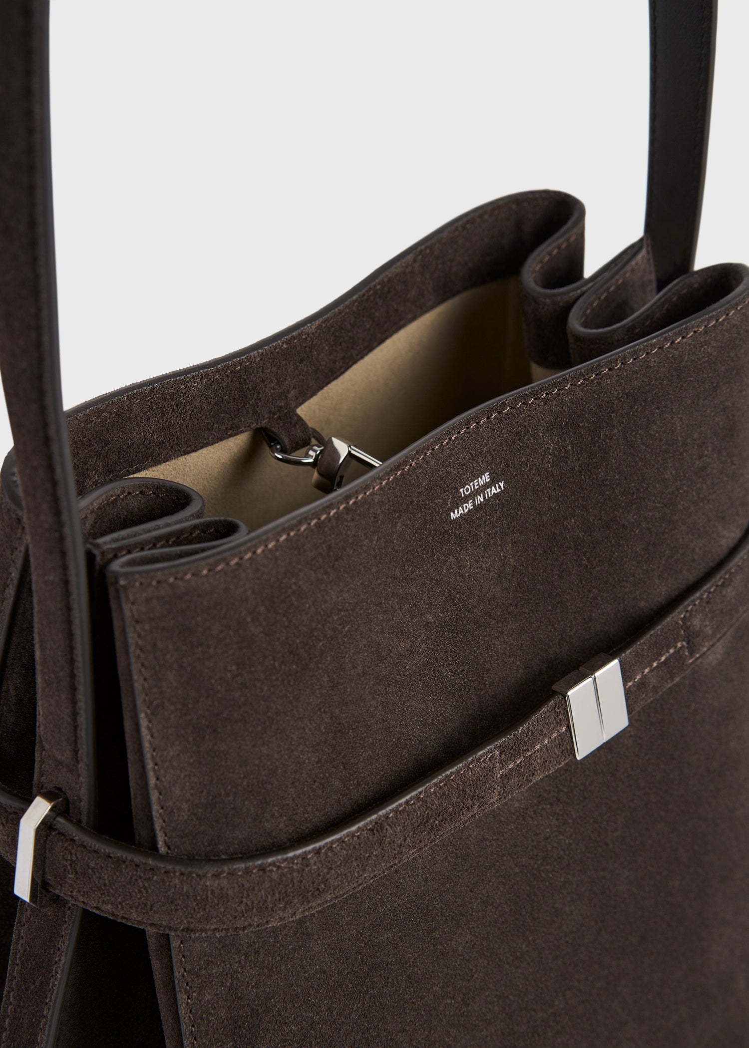 Belted suede bucket bag brown