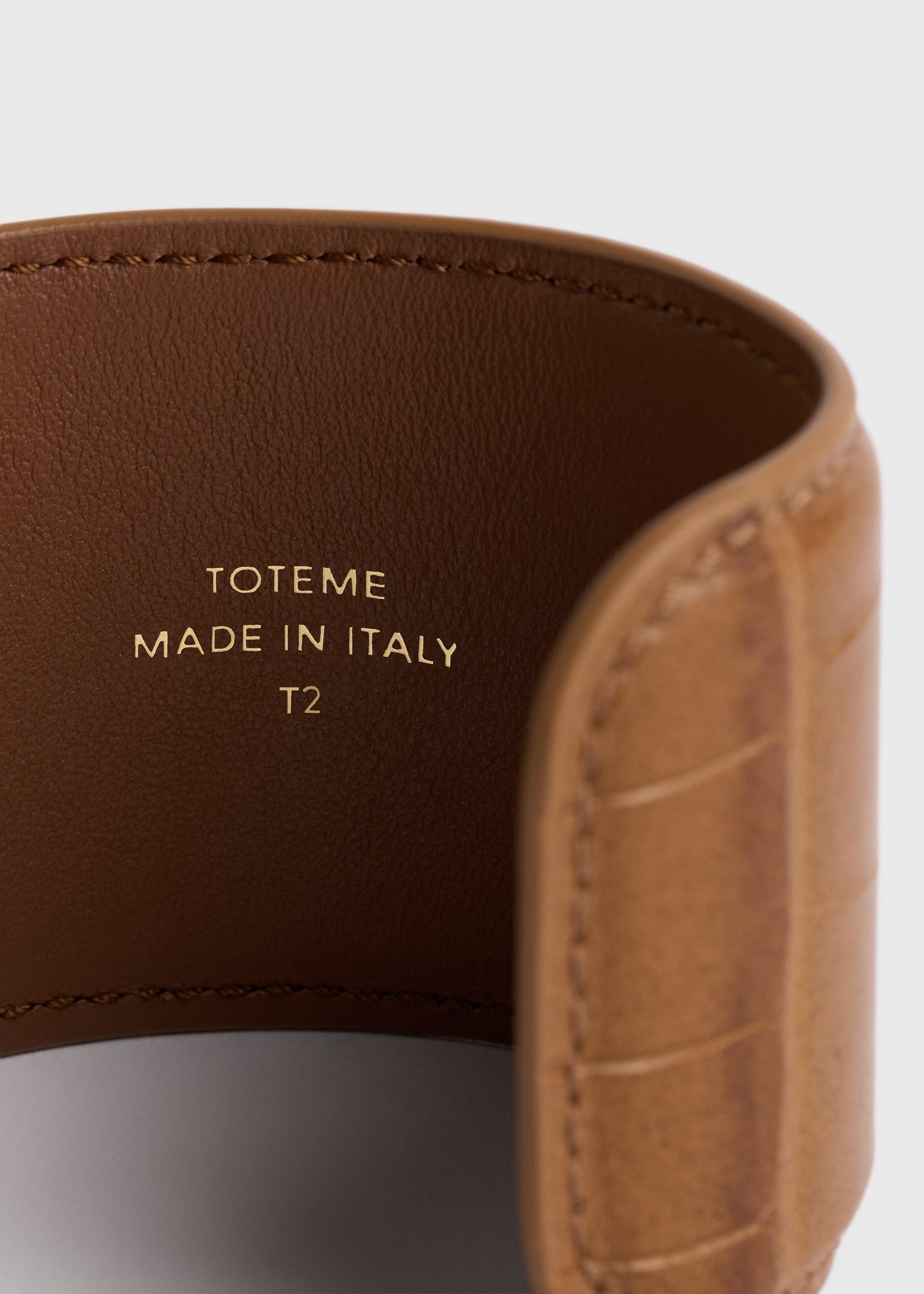 Croco-embossed cuff camel