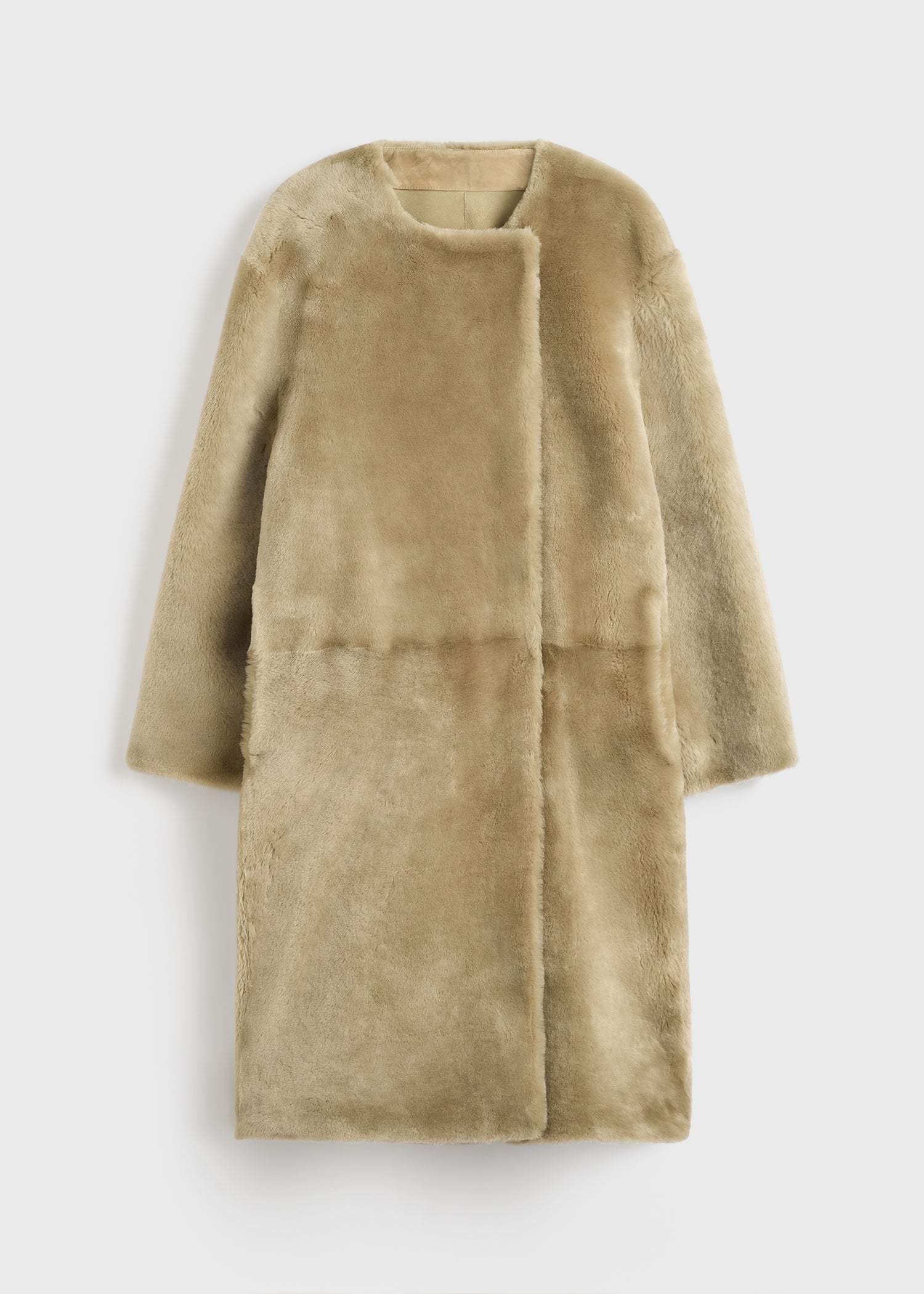 Collarless shearling coat rye