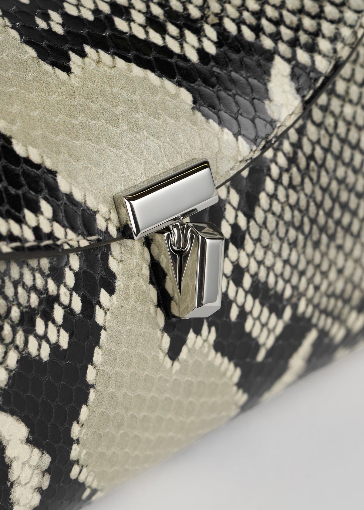 Mini t-lock python-embossed clutch black/ecru