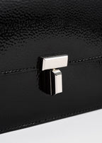 T-lock grained-patent crossbody black