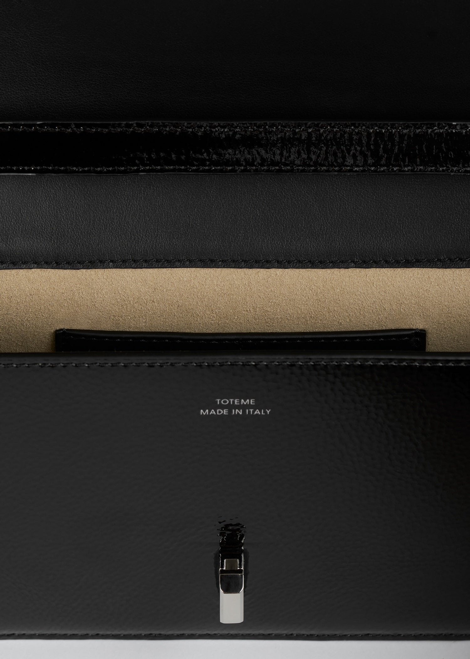 T-lock grained-patent crossbody black