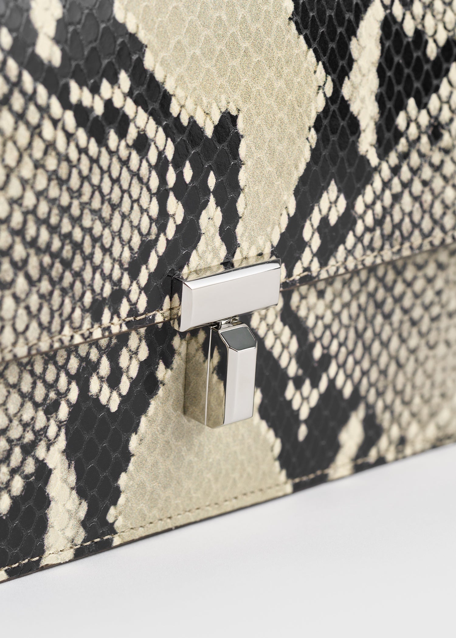 T-lock python-embossed crossbody black/ecru
