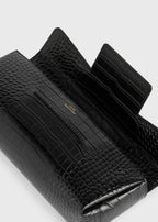 Soft croco-embossed t-clutch black