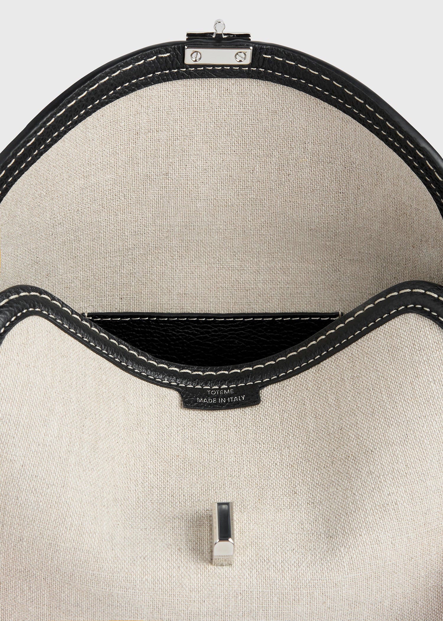 T-lock canvas clutch ecru/black