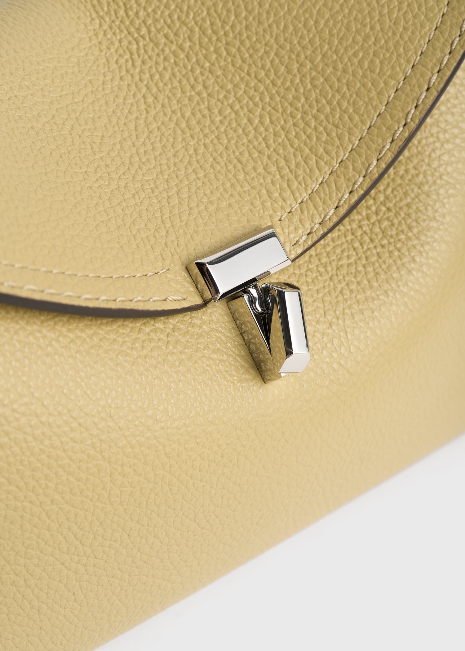 T-lock grained-leather clutch desert