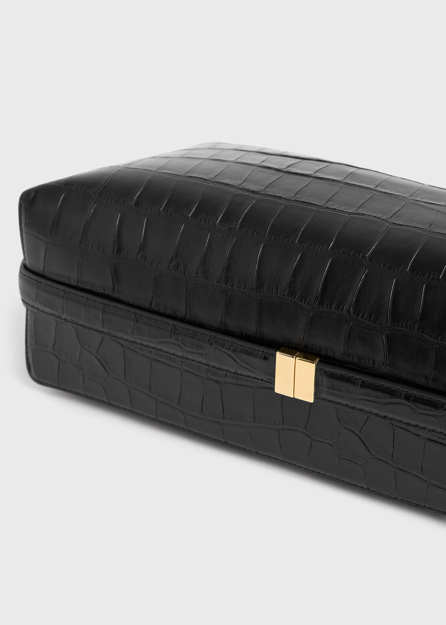 Belted croco-embossed clutch black