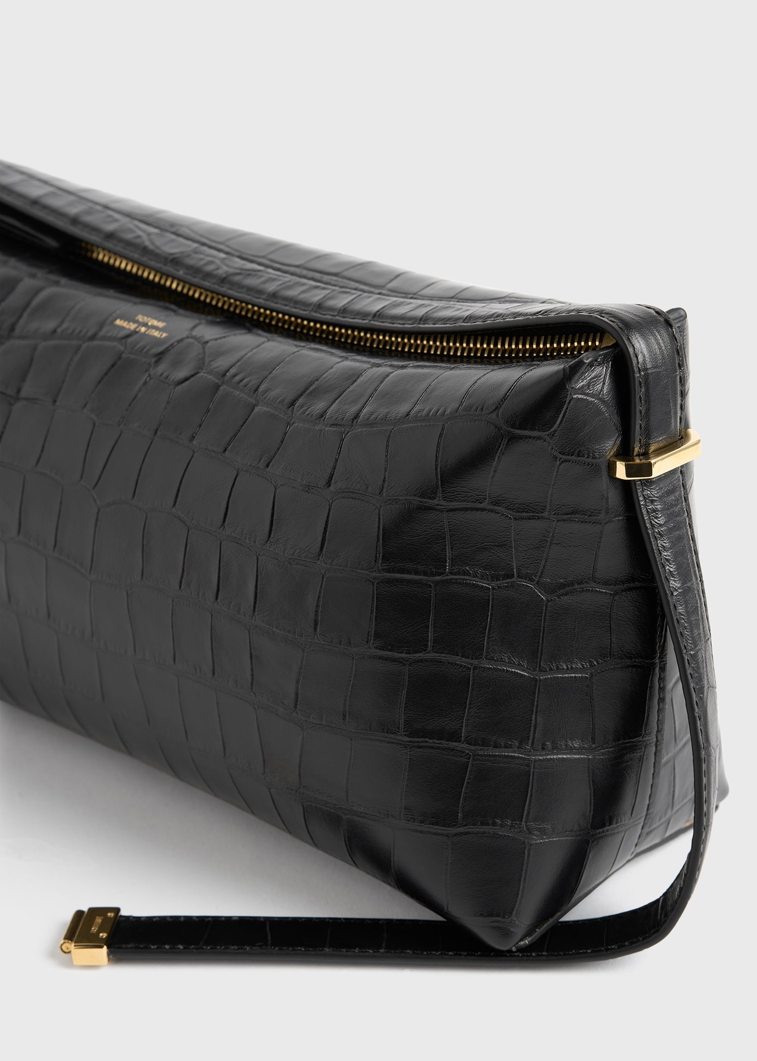 Belted croco-embossed clutch black