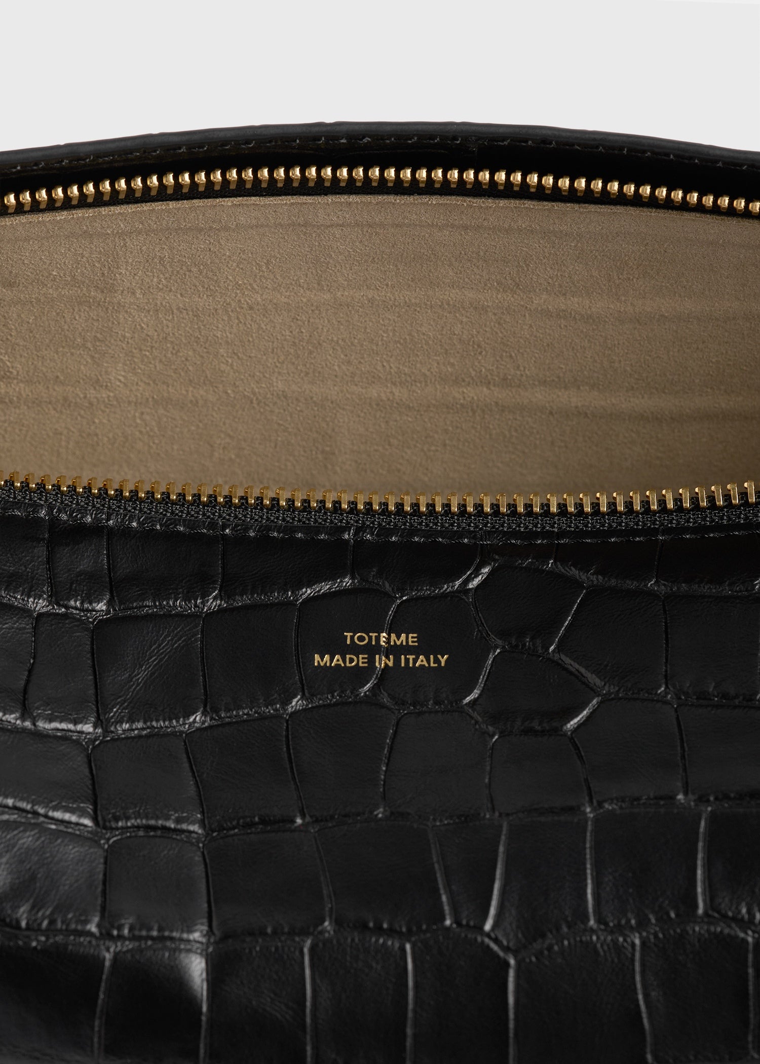 Belted croco-embossed clutch black