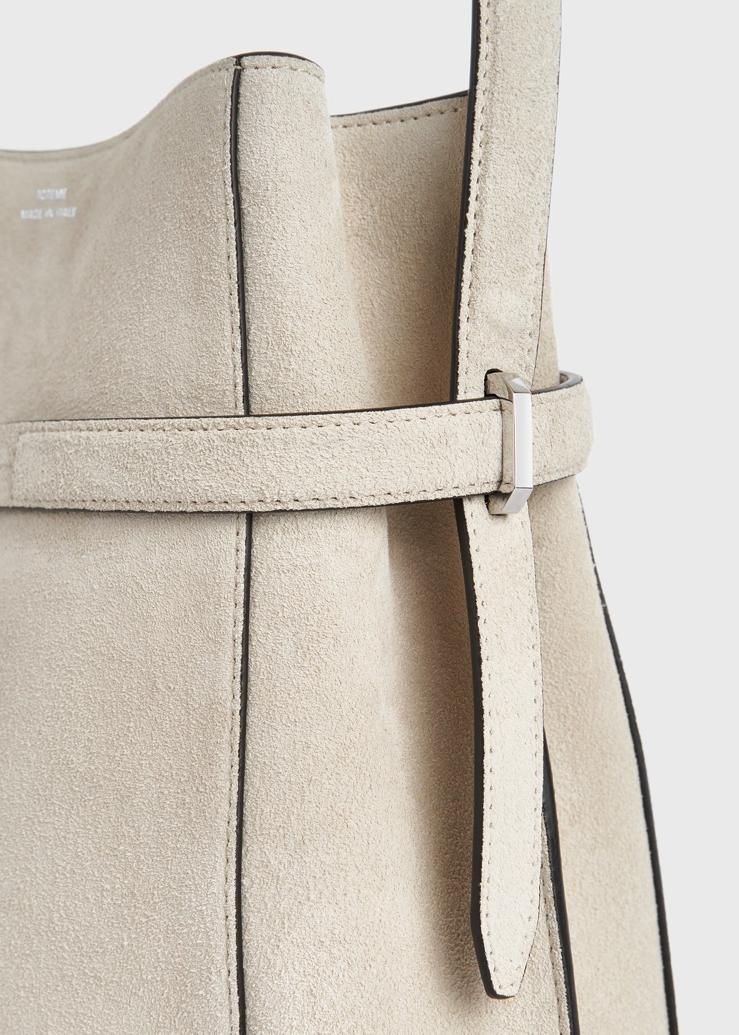 Belted suede bucket bag pearl