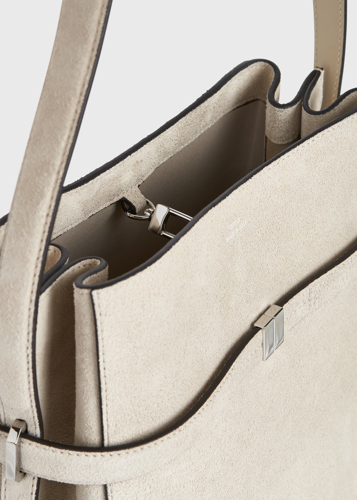 Belted suede bucket bag pearl