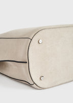 Belted suede bucket bag pearl