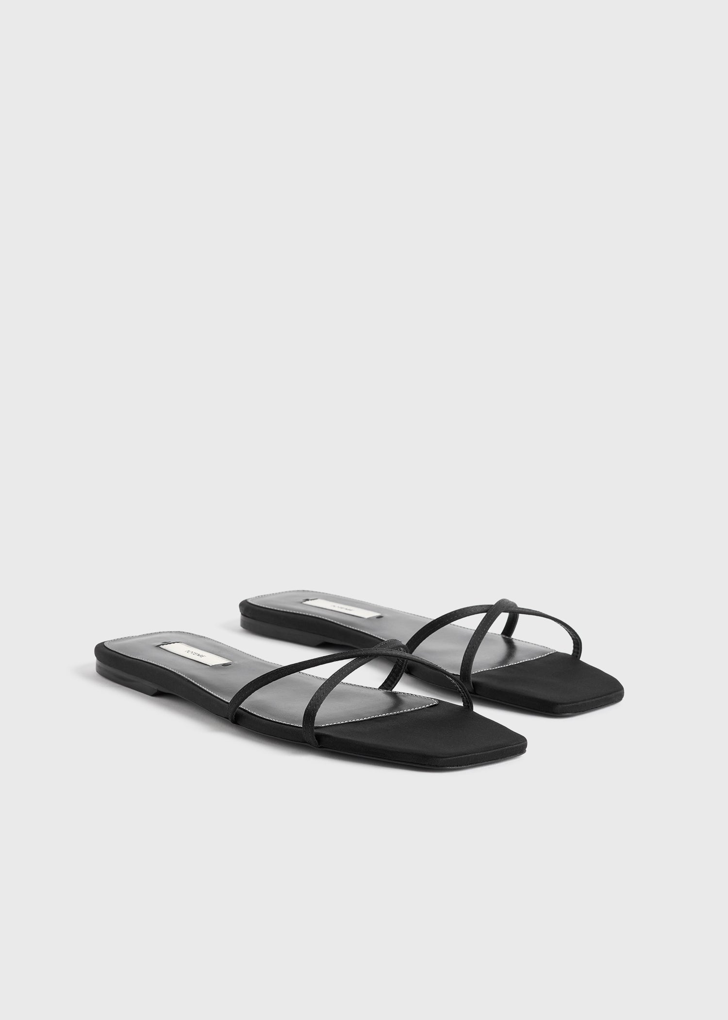Satin crossover slides black – TOTEME - Main Image