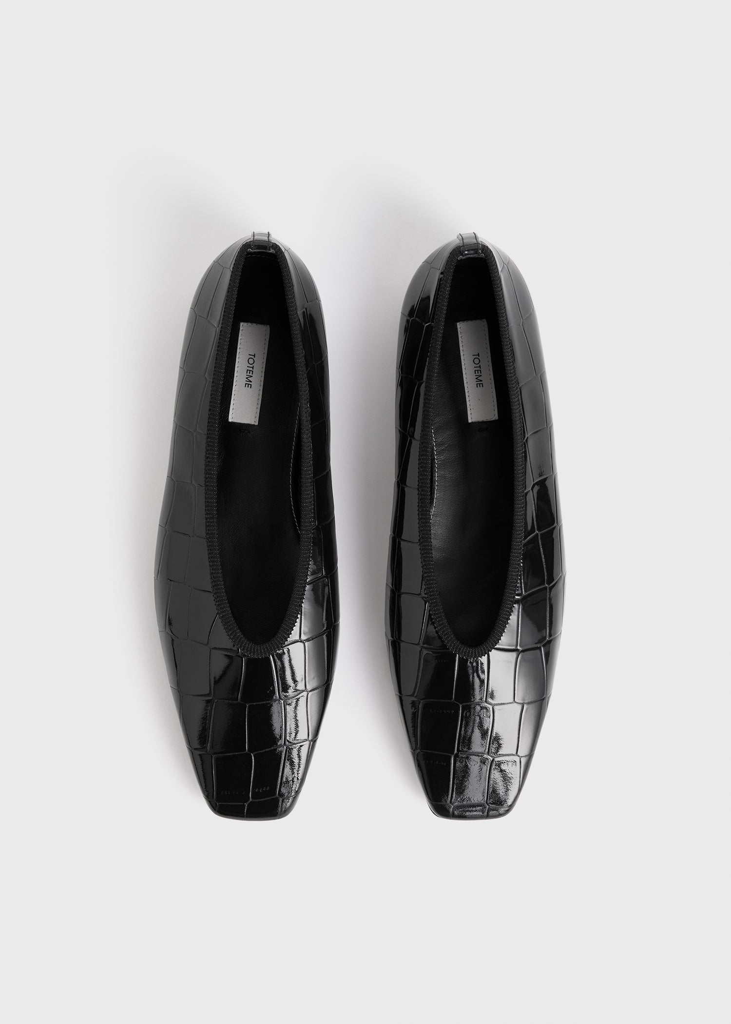 Minimalist croco-embossed ballerinas black
