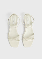 Leather crossover sandals off-white
