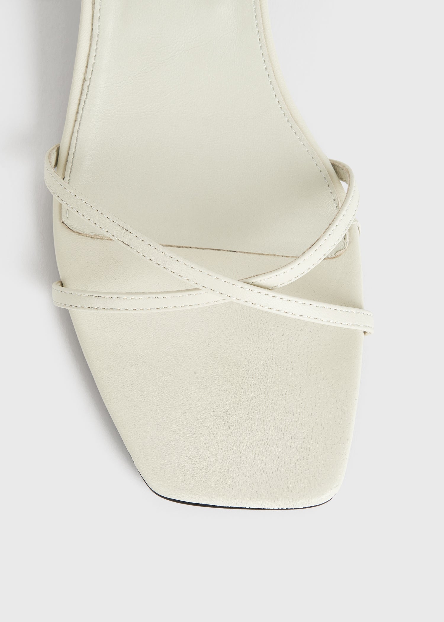 Leather crossover sandals off-white