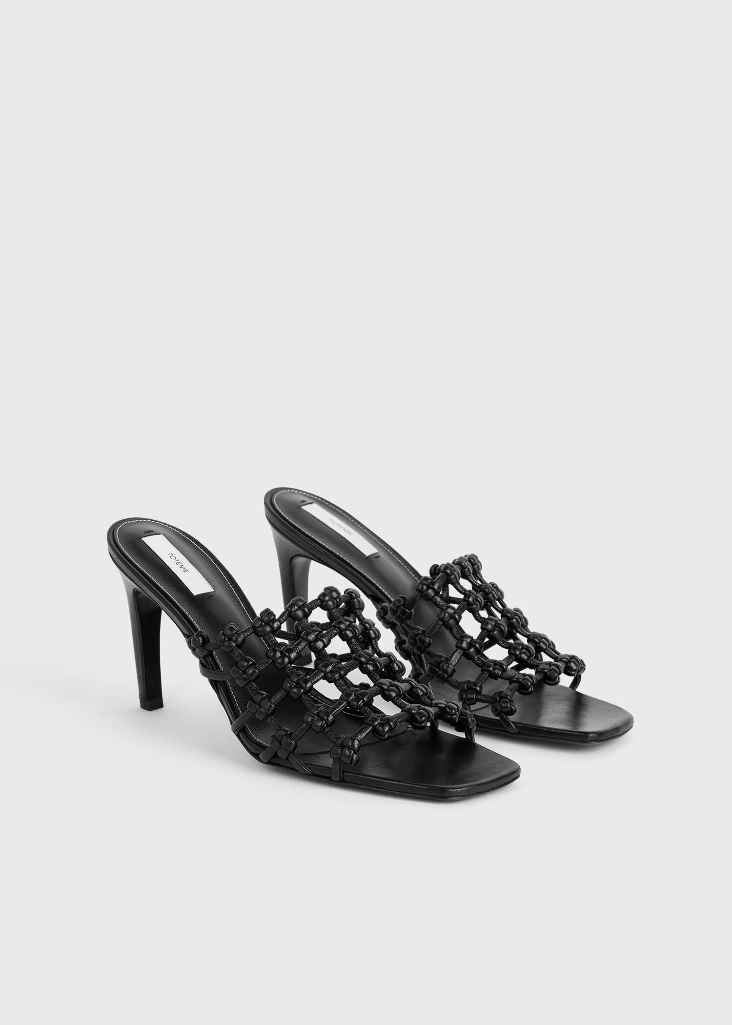Braided-leather bandeau mules black