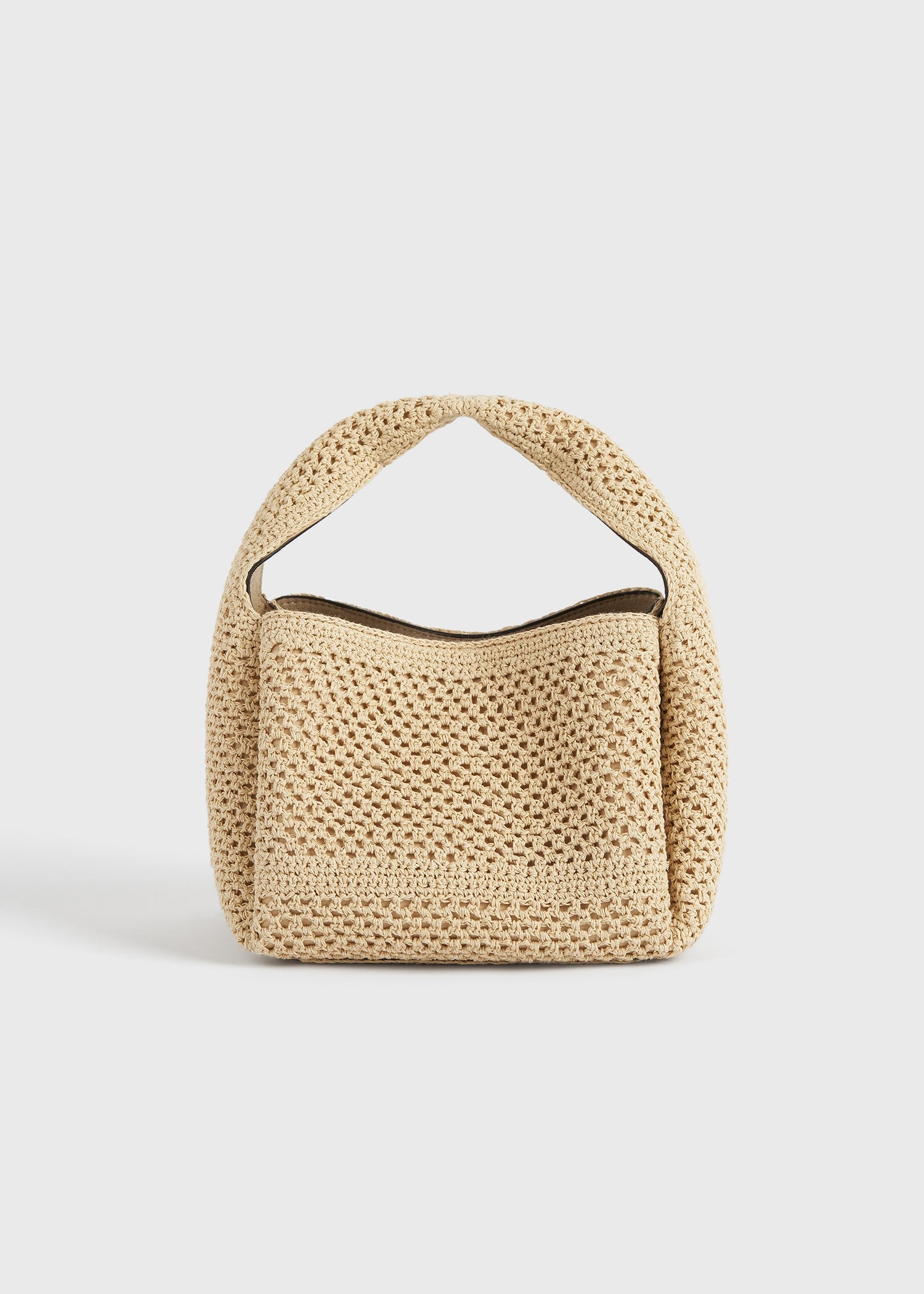 Petite crochet bucket bag vanilla from Toteme - $654