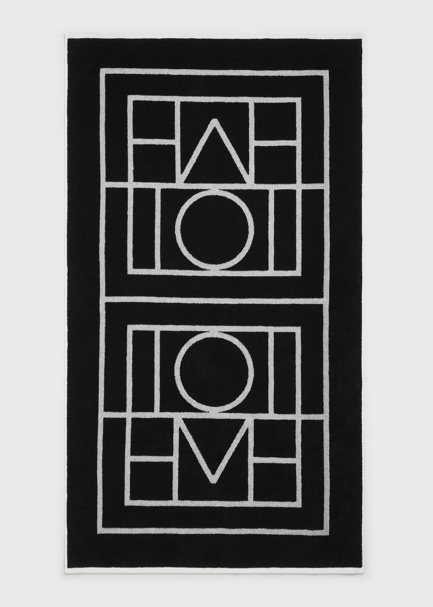 Monogram beach towel black/tofu from Toteme - $210