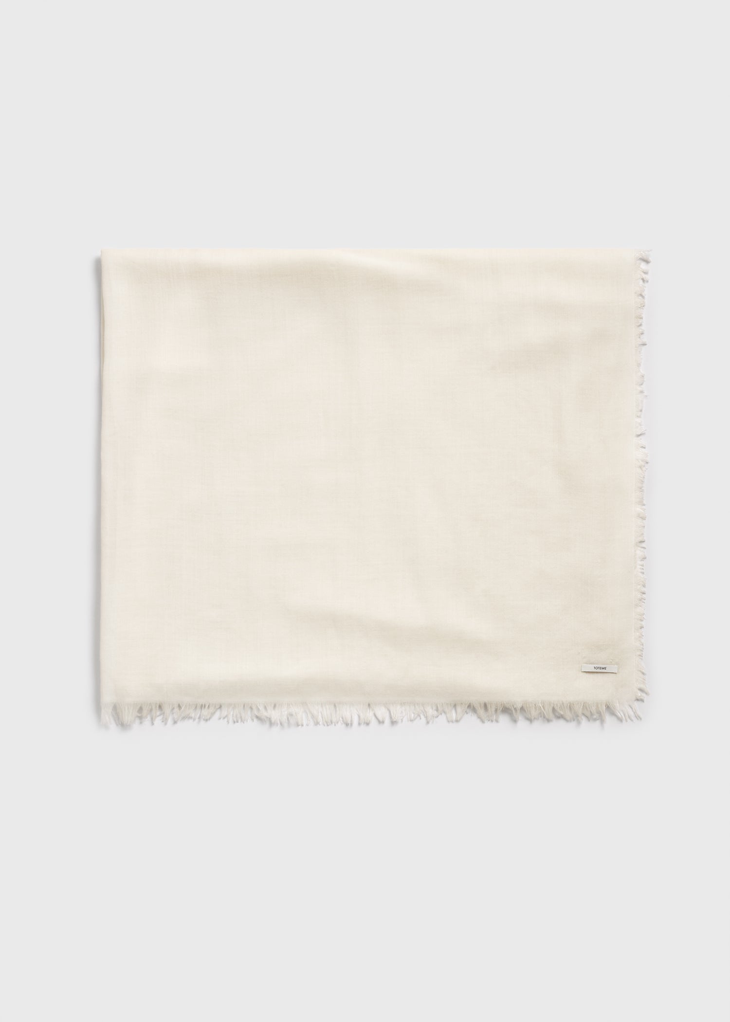 Light wool blanket scarf off-white from Toteme - $460