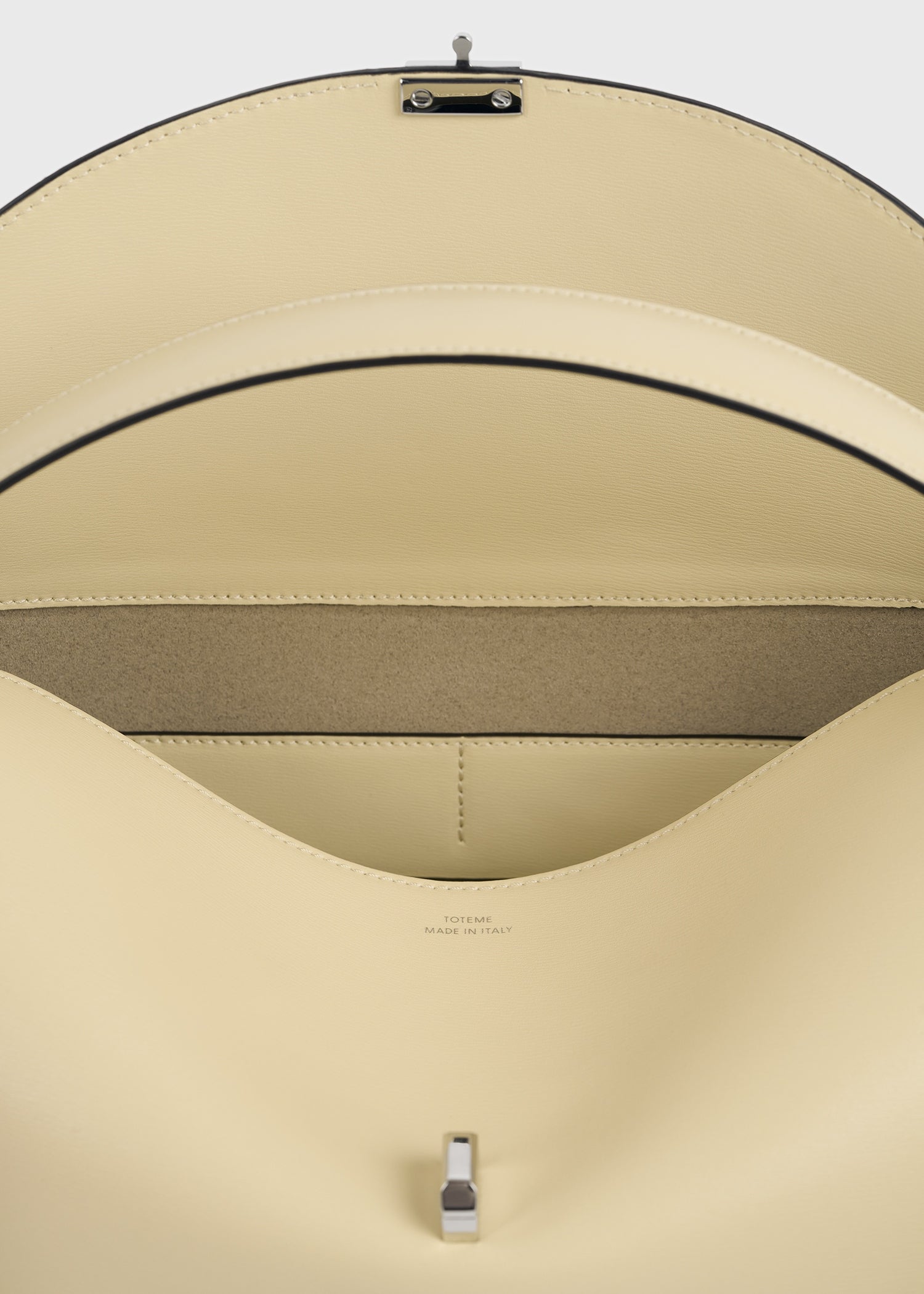 T-lock leather top handle champagne