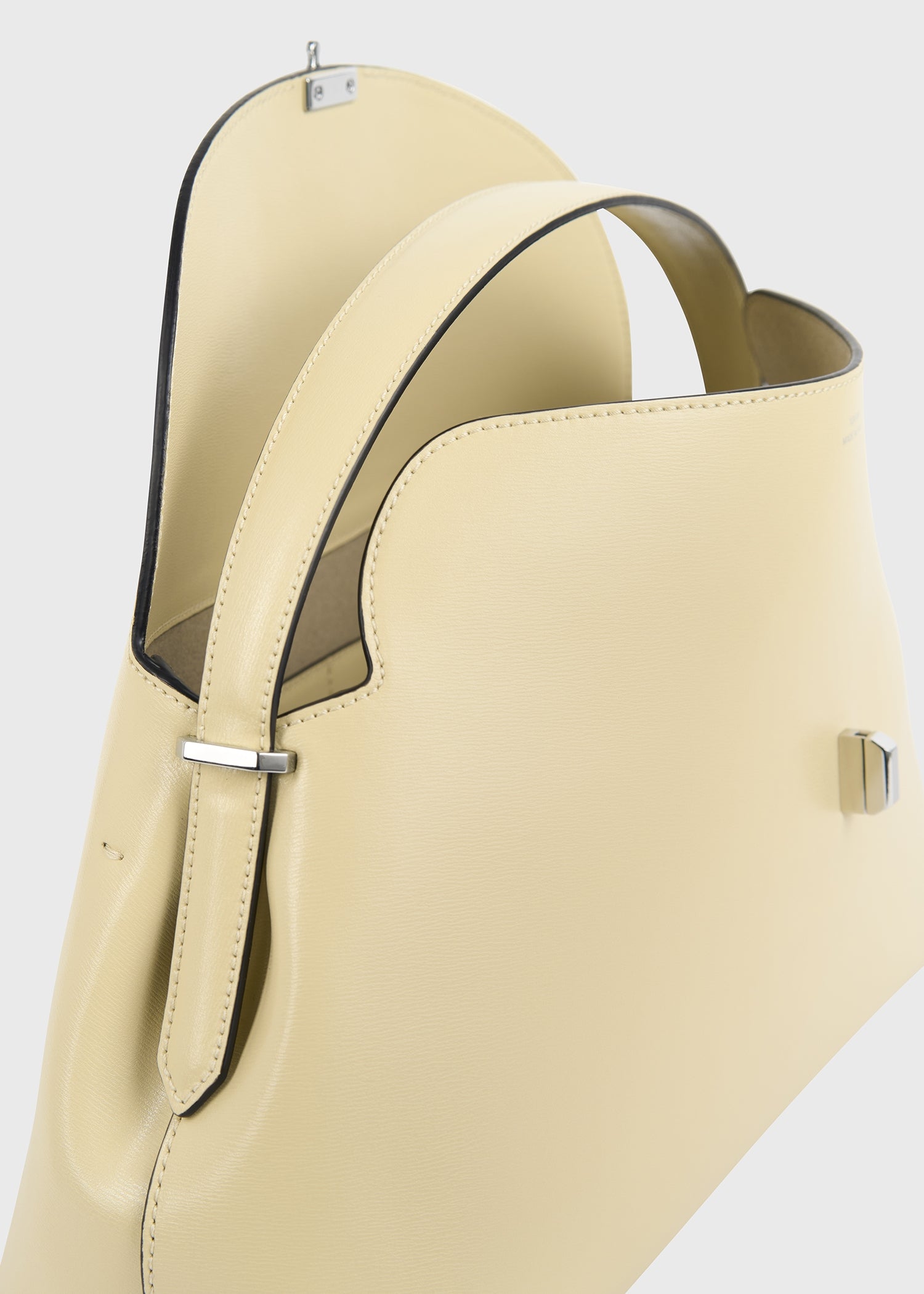 T-lock leather top handle champagne
