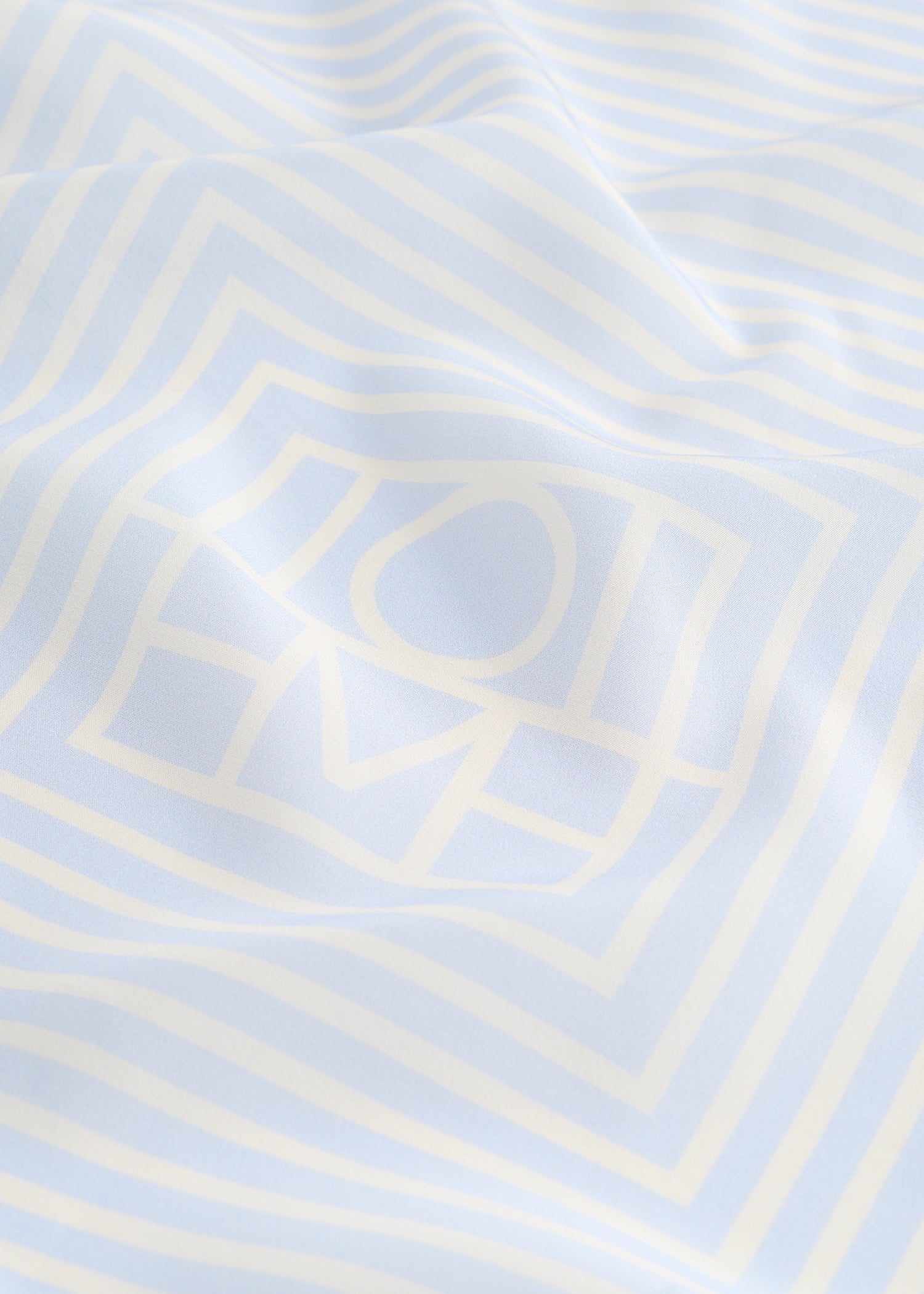 Centered monogram silk scarf sky