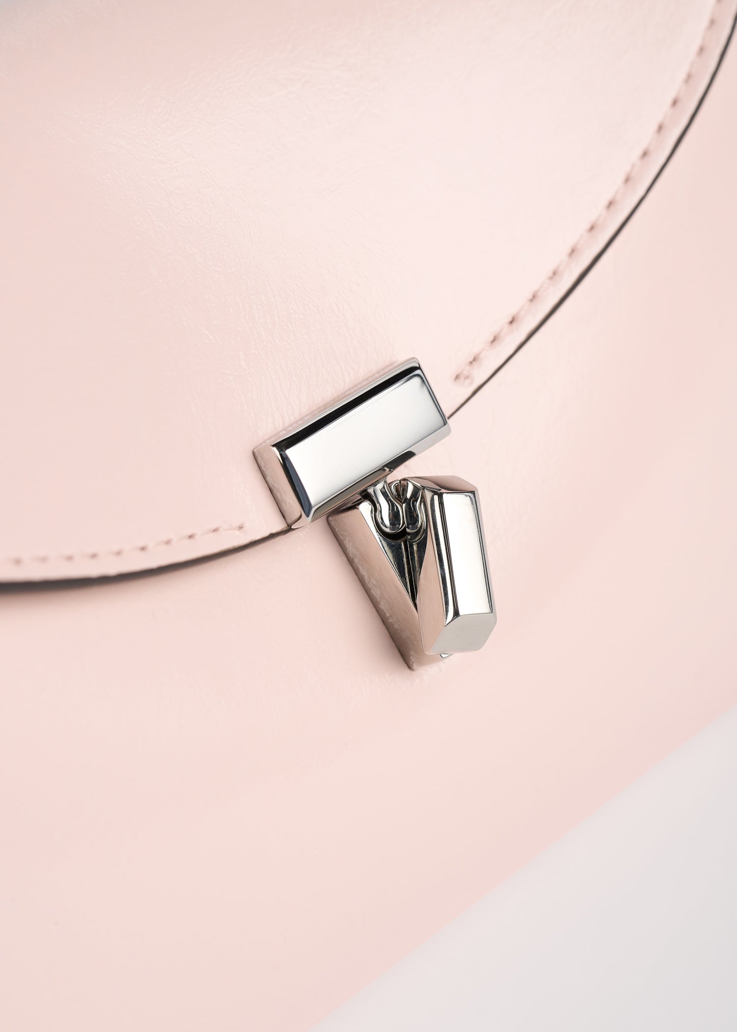 Mini T-lock naplack clutch flamingo