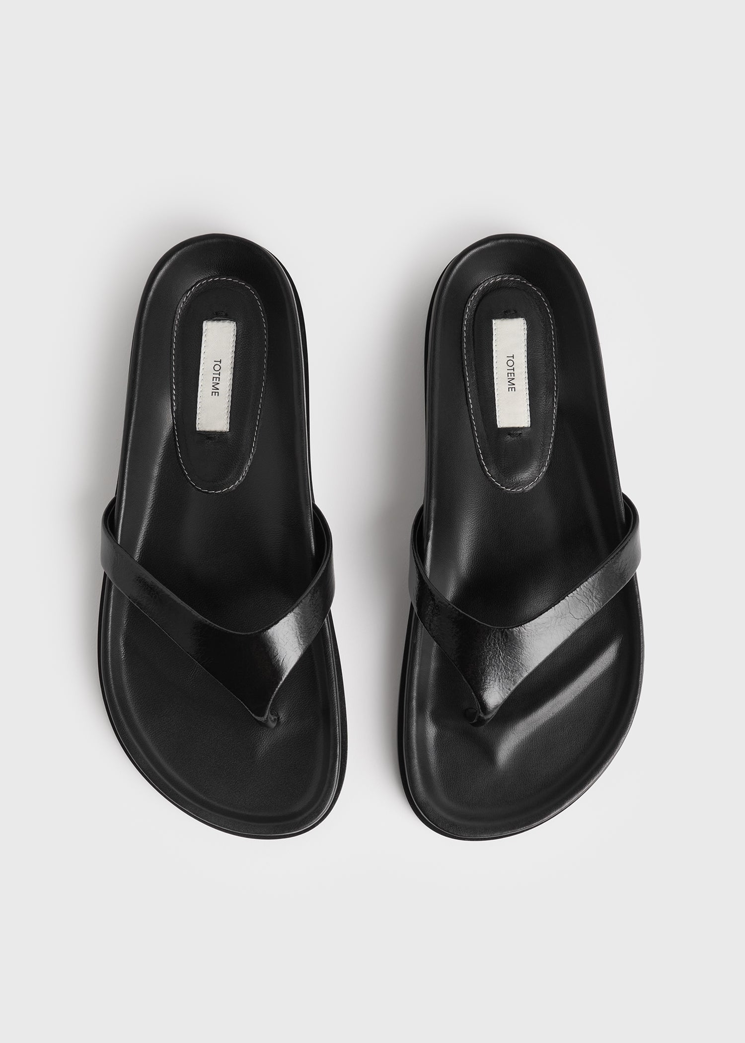 Contoured naplack flip flops black