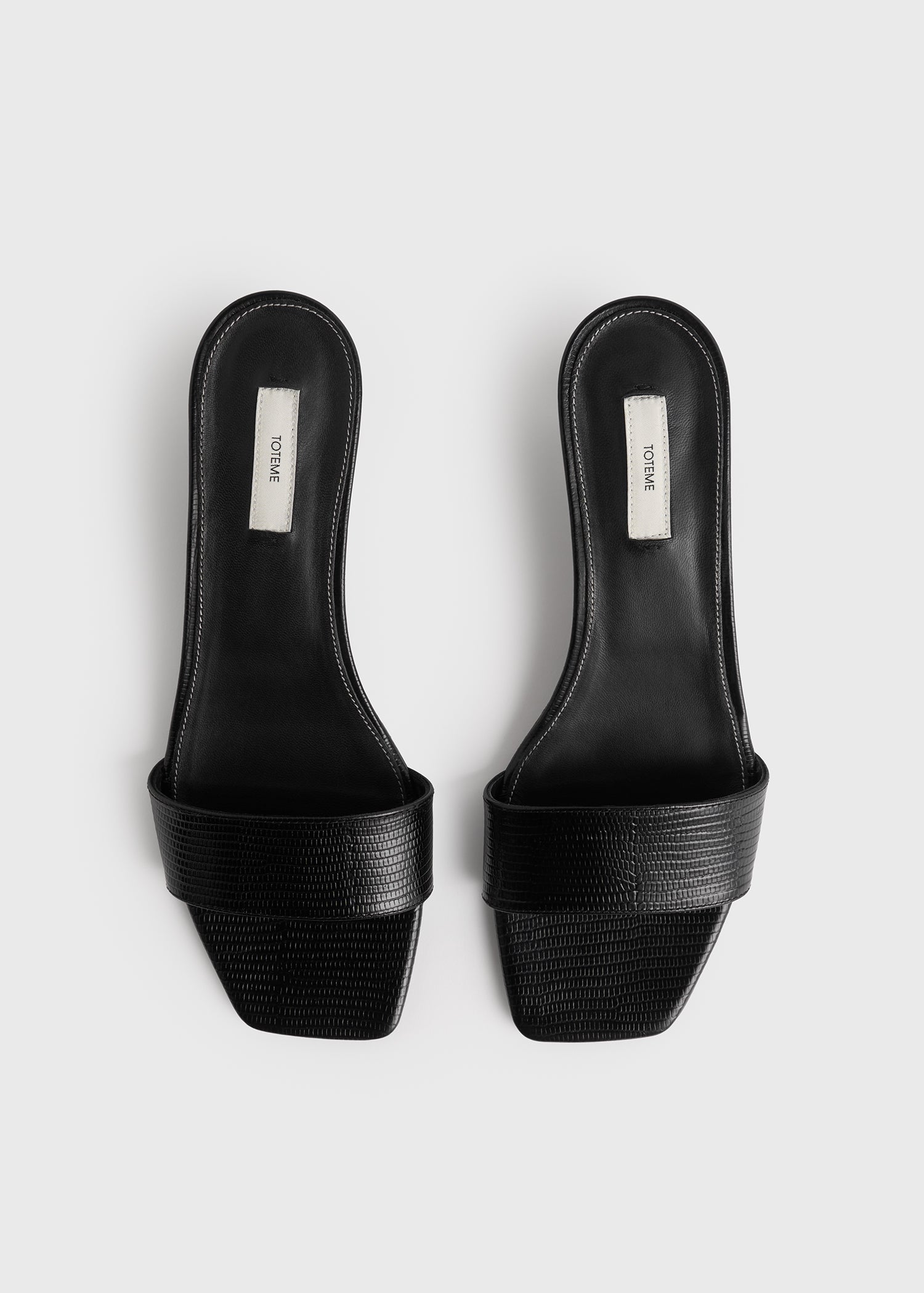 Slim lizard-embossed bandeau mules black