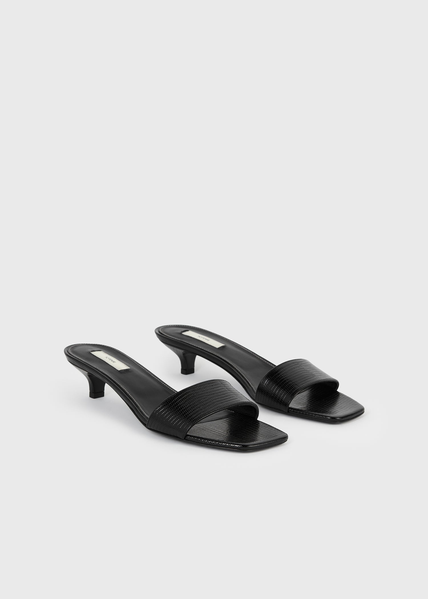 Slim lizard-embossed bandeau mules black