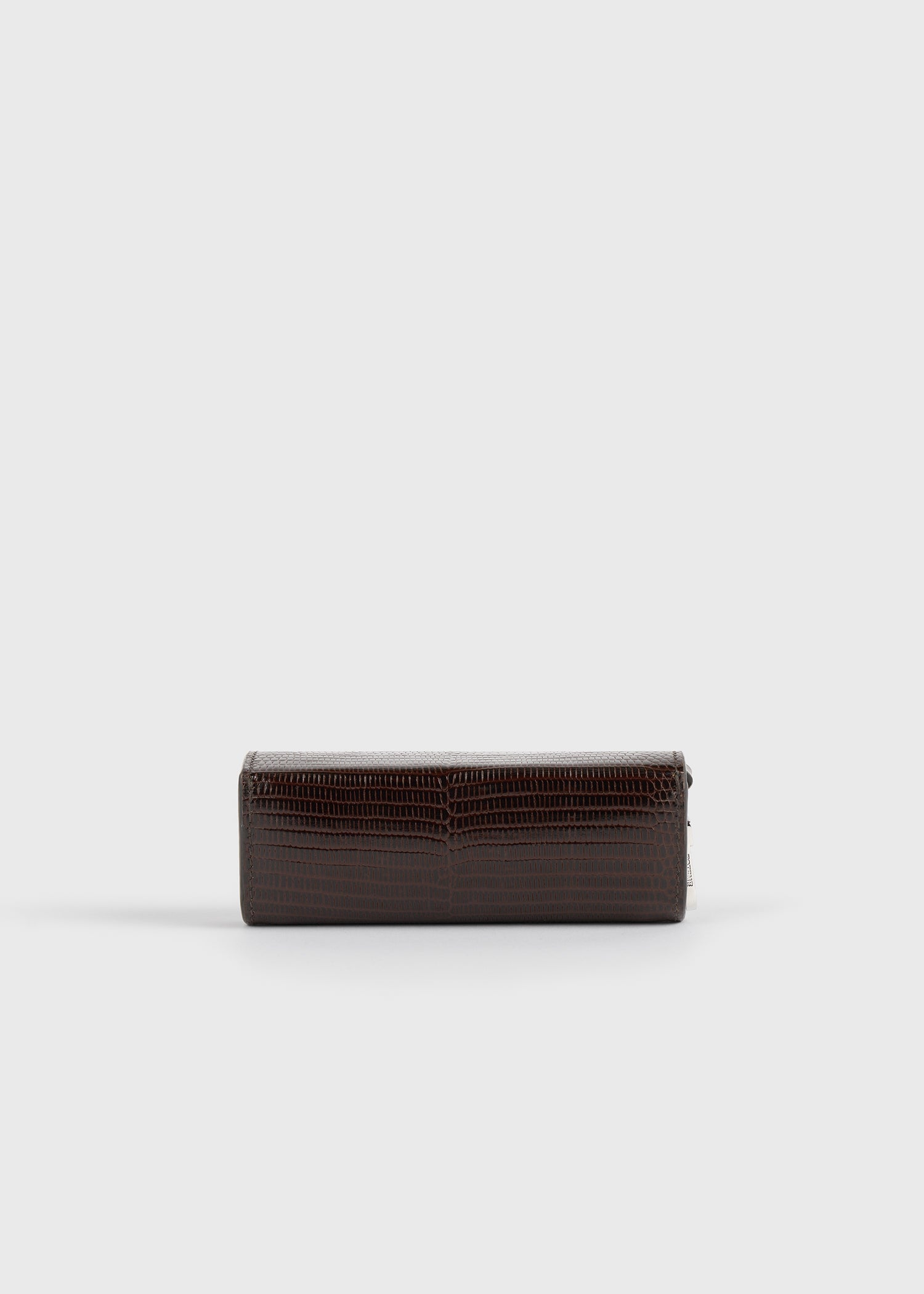 Lizard-embossed lipstick case brown