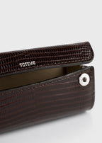 Lizard-embossed lipstick case brown