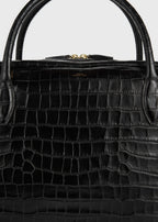 Croco-embossed traveler black