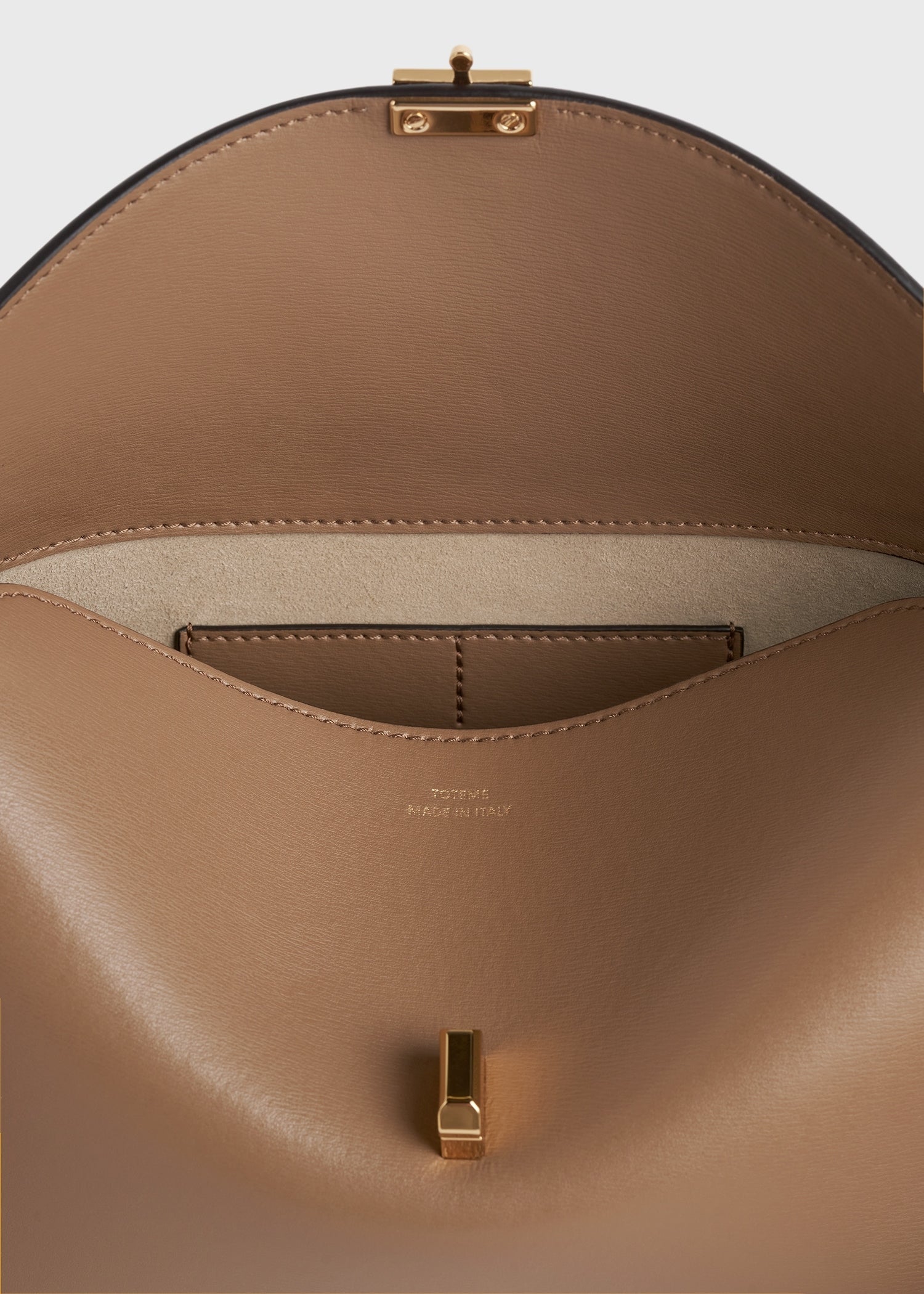 T-lock leather clutch camel