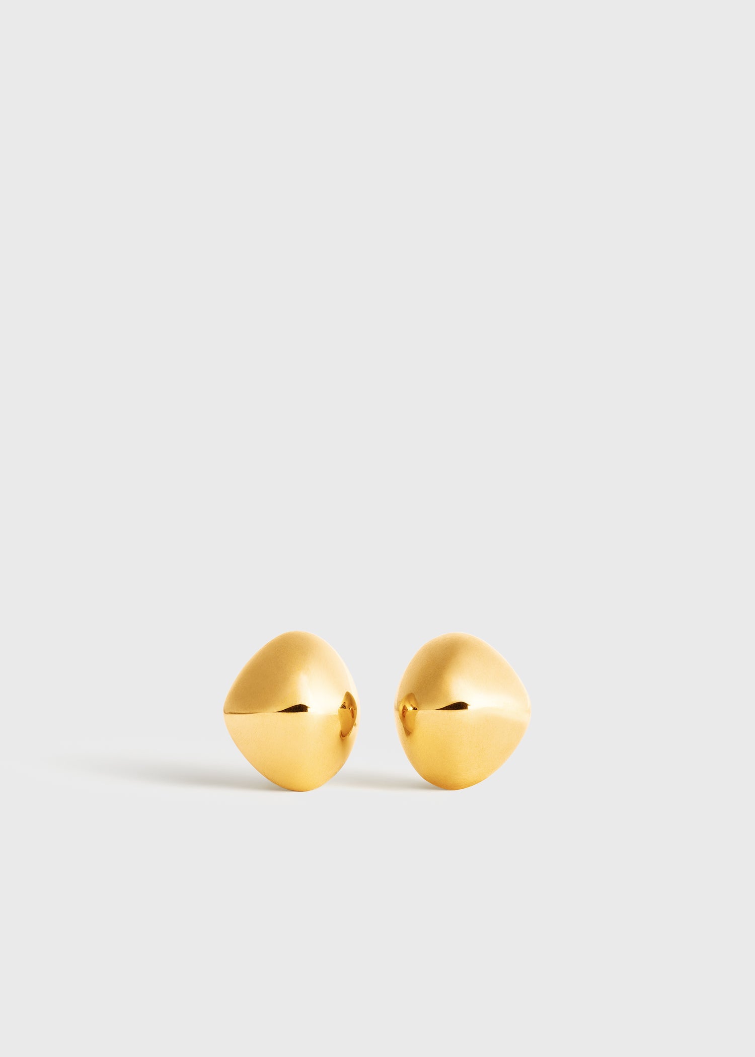 Pebble studs gold from Toteme - $540
