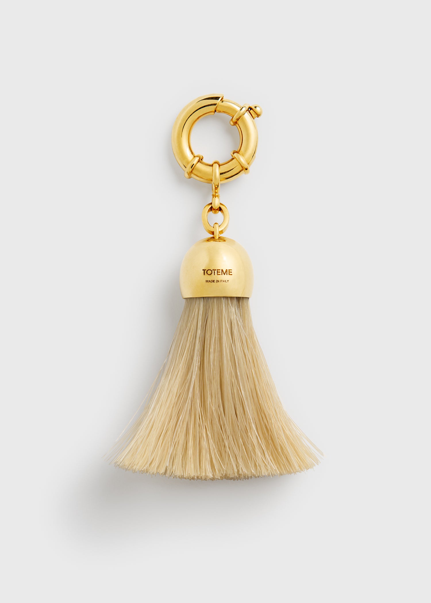 Horsehair charm gold from Toteme - $294