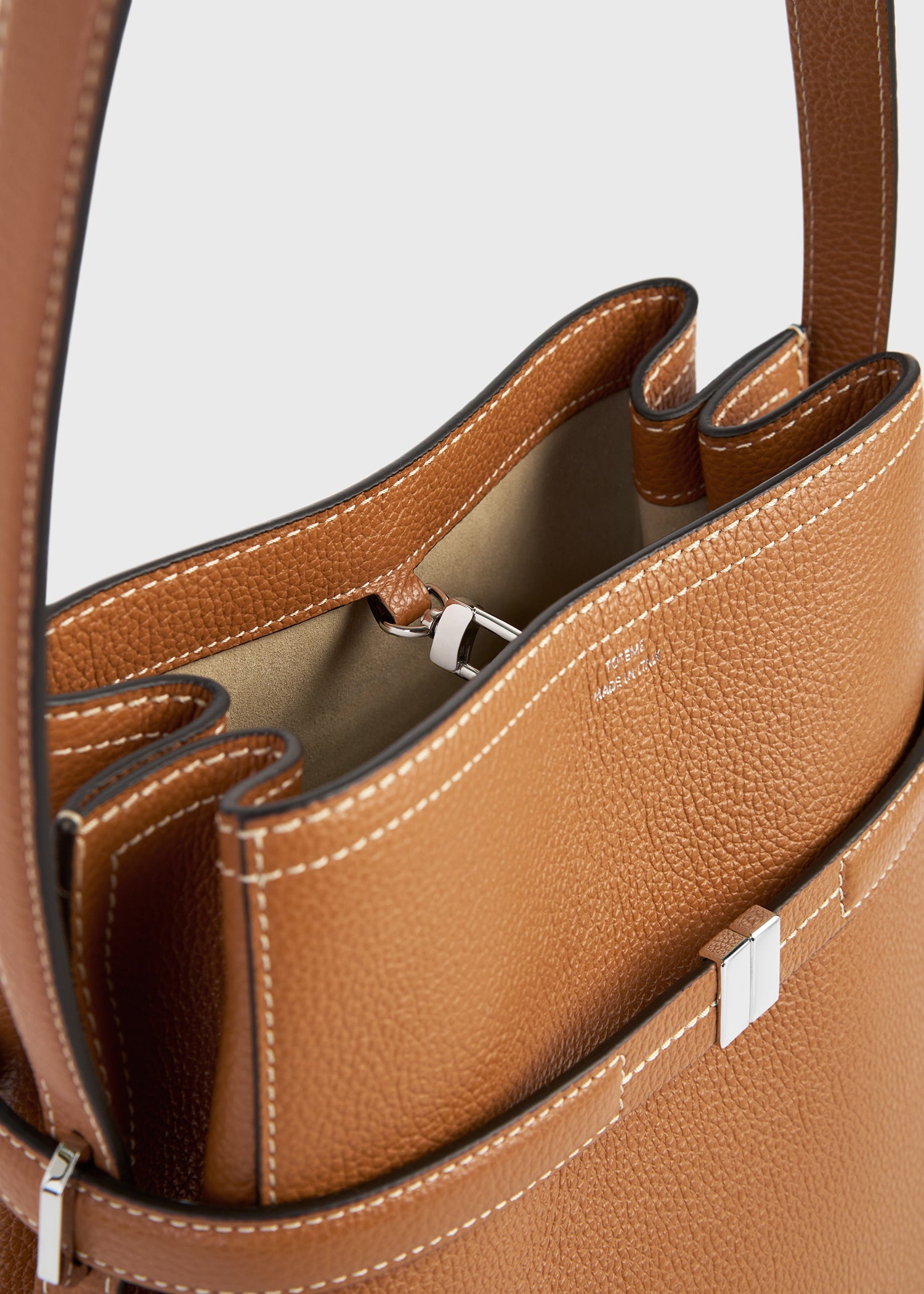 Belted grained-leather bucket bag tan